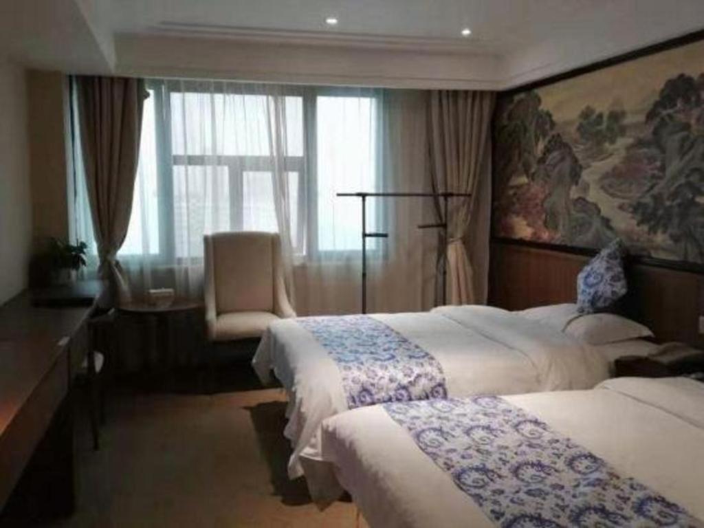 Kaibin International Hotel Цзиндечжен Екстериор снимка