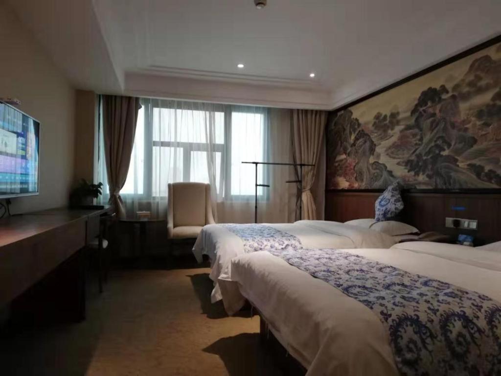 Kaibin International Hotel Цзиндечжен Екстериор снимка