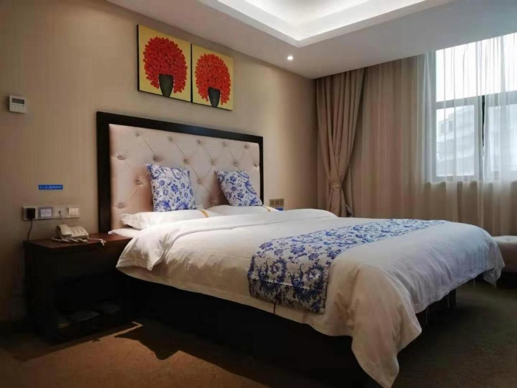 Kaibin International Hotel Цзиндечжен Екстериор снимка