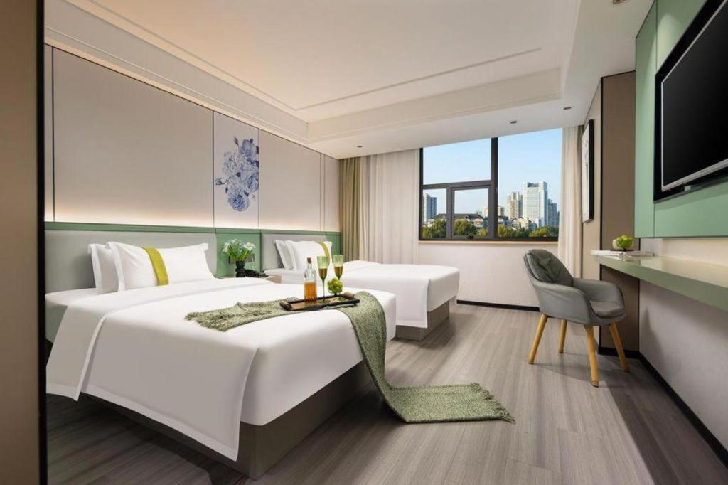 Kaibin International Hotel Цзиндечжен Екстериор снимка